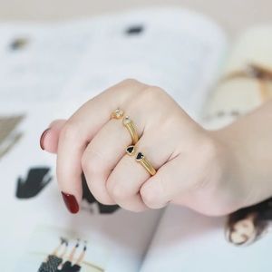 Brand New fashion 18k gold plated adjustable double heart ring. Black color.